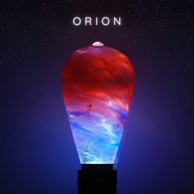 Decorative lamp with red and blue design against a dark background with 'Orion' text.